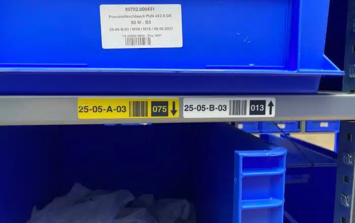 Kennzeichnung Fachbodenregalanlage bei Atlas Copco durch ONK